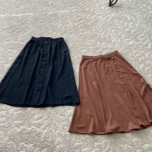 - Bundle 2 of maxi skirts.